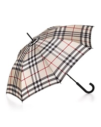 Stay high (fashion) and dry: top off your look with this forever-stylish Burberry umbrella. Stay high (fashion) and dry: top off your look with this forever-stylish Burberry umbrella.