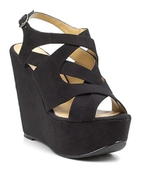 With a towering wedge and chunky platform, the Nadeen wedges have serious, strappy height--pair them with the slimmest skinnies for trend-right balance. With a towering wedge and chunky platform, the Nadeen wedges have serious, strappy height--pair them with the slimmest skinnies for trend-right balance.