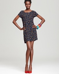 A retro-stylish pop of dots enliven this thoroughly modern silhouette for a look that makes a lasting first impression. A retro-stylish pop of dots enliven this thoroughly modern silhouette for a look that makes a lasting first impression.
