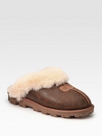 Bomber-inspired suede in a timeless design with shearling lining and a comfy foam sole. Foam heel, 1 (25mm)Suede upperShearling liningFoam solePadded insoleImported Bomber-inspired suede in a timeless design with shearling lining and a comfy foam sole. Foam heel, 1 (25mm)Suede upperShearling liningFoam solePadded insoleImported