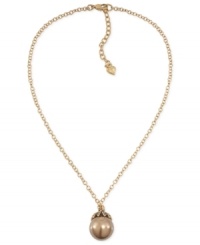 Have yourself a ball with this pendant necklace from Carolee. Crafted from gold-tone mixed metal, the necklace gets a bit of glamour with a glass pearl pendant at the center. Approximate length: 16 inches. Approximate drop: 1 inch.