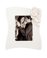 Sculpted gardenias pop with a tinge of pink against this glossy white Flora picture frame. A vision of romance in graceful Lenox porcelain. Sculpted gardenias pop with a tinge of pink against this glossy white Flora picture frame. A vision of romance in graceful Lenox porcelain.