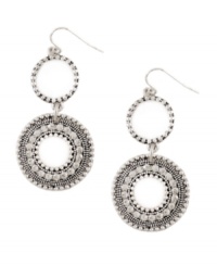 Take hippie-chic to a whole new level. These bohemian-style earrings by Jessica Simpson feature artfully-crafted double disc drops in worn silver tone mixed metal. Approximate drop: 3 inches. Take hippie-chic to a whole new level. These bohemian-style earrings by Jessica Simpson feature artfully-crafted double disc drops in worn silver tone mixed metal. Approximate drop: 3 inches.