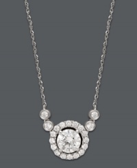 Chic and shapely, this stunning Arabella style will round out your look for years to come. Crafted in 14k white gold, pendant features round-cut Swarovski zirconias (2-1/4 ct. t.w.) in an intricate circular pattern. Approximate length: 18 inches. Approximate drop: 3/4 inch. Chic and shapely, this stunning Arabella style will round out your look for years to come. Crafted in 14k white gold, pendant features round-cut Swarovski zirconias (2-1/4 ct. t.w.) in an intricate circular pattern. Approximate length: 18 inches. Approximate drop: 3/4 inch.