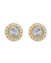 For a look that shines, yet subtle enough for every day style. Swarovski's chic, circle studs feature a round-cut crystal center stone surrounded by sparkling crystal edges. Crafted in gold tone mixed metal. Approximate diameter: 1/3 inches. For a look that shines, yet subtle enough for every day style. Swarovski's chic, circle studs feature a round-cut crystal center stone surrounded by sparkling crystal edges. Crafted in gold tone mixed metal. Approximate diameter: 1/3 inches.
