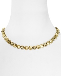 A refined take on rock chic, this House of Harlow 1960 necklace traces the neck in chunky, engraved gold-plated beads. A refined take on rock chic, this House of Harlow 1960 necklace traces the neck in chunky, engraved gold-plated beads.
