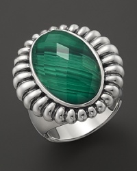 A faceted malachite doublet is trimmed in fluted sterling silver on this classic Lagos ring. A faceted malachite doublet is trimmed in fluted sterling silver on this classic Lagos ring.