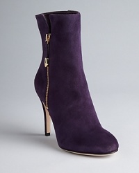 These Joan & David booties are high on style in elegant suede, from shaft to stiletto. Gleaming zip accents up the luxe factor. These Joan & David booties are high on style in elegant suede, from shaft to stiletto. Gleaming zip accents up the luxe factor.