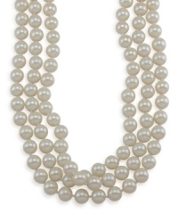 Wrap up your overall look with a last minute touch. This long, rope necklace by Carolee features shimmery white glass pearls (10 mm) set in mixed metal. Approximate length: 72 inches.