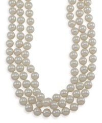 Wrap up your overall look with a last minute touch. This long, rope necklace by Carolee features shimmery white glass pearls (10 mm) set in mixed metal. Approximate length: 72 inches. Wrap up your overall look with a last minute touch. This long, rope necklace by Carolee features shimmery white glass pearls (10 mm) set in mixed metal. Approximate length: 72 inches.