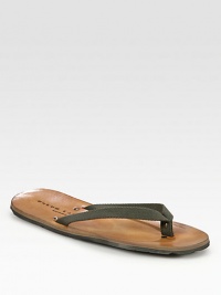 Incredibly comfortable summer-style constructed in fine leather with a webbed cotton thong upper.Cotton upperLeather liningRubber soleImported Incredibly comfortable summer-style constructed in fine leather with a webbed cotton thong upper.Cotton upperLeather liningRubber soleImported