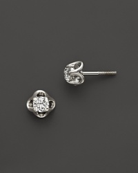 Diamonds sparkle in 14K. white gold settings. Diamonds sparkle in 14K. white gold settings.