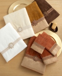 Elegant with opulent detailing, the Avanti Braided Cuff bath towels' style and texture are a welcome addition to any bathroom. Available in a variety of hues, these towels feature an ornate braided cuff. Elegant with opulent detailing, the Avanti Braided Cuff bath towels' style and texture are a welcome addition to any bathroom. Available in a variety of hues, these towels feature an ornate braided cuff.