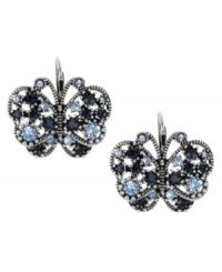 Spread your style wings with these too-cute butterfly earrings from Betsey Johnson. This cool blue design features rhodium-plating and eye-catching crystals accents. Approximate drop: 1 inch. Spread your style wings with these too-cute butterfly earrings from Betsey Johnson. This cool blue design features rhodium-plating and eye-catching crystals accents. Approximate drop: 1 inch.