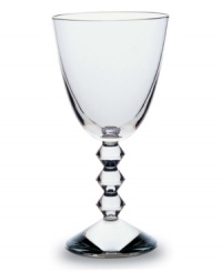 The Vega Stemware Collection will make a unique and striking addition to your finely set table. Each piece features a neck lined with thick connecting diamond-shaped glass studs leading fron the commanding sturdy base to the simple bulb, lending a look that has the timeless effect and appeal of glittering diamonds. The Vega Stemware Collection will make a unique and striking addition to your finely set table. Each piece features a neck lined with thick connecting diamond-shaped glass studs leading fron the commanding sturdy base to the simple bulb, lending a look that has the timeless effect and appeal of glittering diamonds.
