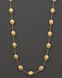 From the Siviglia collection, a necklace with large-sized beans, designed by Marco Bicego. From the Siviglia collection, a necklace with large-sized beans, designed by Marco Bicego.