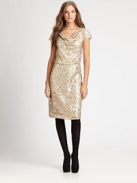 Shimmering sequins give this chic sheath, with a comfortable elasticized waist, stunning appeal.CowlneckCap sleevesElasticized waistFully linedAbout 41 from shoulder to hemPolyesterDry cleanImported Model shown is 5'10 (177cm) wearing US size Small. Shimmering sequins give this chic sheath, with a comfortable elasticized waist, stunning appeal.CowlneckCap sleevesElasticized waistFully linedAbout 41 from shoulder to hemPolyesterDry cleanImported Model shown is 5'10 (177cm) wearing US size Small.