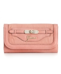 Add a little glam to your life. This sleek clutch style from GUESS features the classic script logo at front with and a sparkling faux turnlock accent. Add a little glam to your life. This sleek clutch style from GUESS features the classic script logo at front with and a sparkling faux turnlock accent.