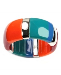 This bold bracelet style will make your look pop! Nine West's chic colorblock bangle features bright red, orange, blue and teal plastic pieces. Set in silver tone mixed metal. Bracelet stretches to fit wrist. Approximate diameter: 2-1/2 inches. This bold bracelet style will make your look pop! Nine West's chic colorblock bangle features bright red, orange, blue and teal plastic pieces. Set in silver tone mixed metal. Bracelet stretches to fit wrist. Approximate diameter: 2-1/2 inches.
