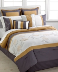 Intricate blossoms sit upon a pristine white ground in this Nylo comforter set, featuring simple solids and stripe accents for a charming presentation. Comes complete with shams, bedskirt and two decorative pillows to transform the bedroom into a relaxing retreat. Intricate blossoms sit upon a pristine white ground in this Nylo comforter set, featuring simple solids and stripe accents for a charming presentation. Comes complete with shams, bedskirt and two decorative pillows to transform the bedroom into a relaxing retreat.
