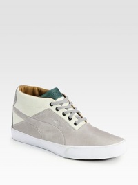 Cool-casual style defines this classic sneaker constructed of smooth leather and suede.Leather/suede upperLeather liningPadded insoleRubber soleImported Cool-casual style defines this classic sneaker constructed of smooth leather and suede.Leather/suede upperLeather liningPadded insoleRubber soleImported
