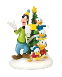 Goofy and Daffy lead three young ducks in cherished Christmas carols. Posing in front of a star-topped tree, these favorite characters add a silly, joyful note to Mickey's Village. From Department 56. Goofy and Daffy lead three young ducks in cherished Christmas carols. Posing in front of a star-topped tree, these favorite characters add a silly, joyful note to Mickey's Village. From Department 56.