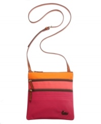 This season is all about the colorblock, and this versatile design by Dooney & Bourke executes it perfectly. Two exterior pockets provide easy access to necessities while a tri-tone exterior keeps you right on trend. This season is all about the colorblock, and this versatile design by Dooney & Bourke executes it perfectly. Two exterior pockets provide easy access to necessities while a tri-tone exterior keeps you right on trend.