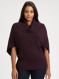 Made from a pristine blend of merino wool and camel hair, a cocoon sweater with a hint of stretch to flatter your shape. FunnelneckElbow-length sleevesPull-on styleRibbed trimAbout 27 from shoulder to hemMerino wool/camel hair/nylonDry cleanImported of Italian fabric Made from a pristine blend of merino wool and camel hair, a cocoon sweater with a hint of stretch to flatter your shape. FunnelneckElbow-length sleevesPull-on styleRibbed trimAbout 27 from shoulder to hemMerino wool/camel hair/nylonDry cleanImported of Italian fabric