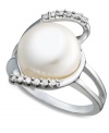 Refined beauty. This sterling silver ring exudes style and elegance with a cultured freshwater button pearl (11-12 mm) surrounded by swirls of diamonds (1 ct. t.w.). Approximate length: 3/4 inch. Approximate width: 1/2 inch. Size 7.