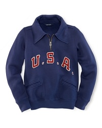 This sporty long-sleeved pullover in ultra-soft cotton fleece celebrates Team USA's participation in the 2012 Olympics with U.S.A. patching and vintage-inspired style. This sporty long-sleeved pullover in ultra-soft cotton fleece celebrates Team USA's participation in the 2012 Olympics with U.S.A. patching and vintage-inspired style.