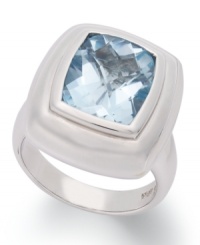 Cushion-cut and totally chic! This glamorous gemstone ring features a cushion-cut blue topaz (4-3/4 ct. t.w.) set in sterling silver. Size 7. Cushion-cut and totally chic! This glamorous gemstone ring features a cushion-cut blue topaz (4-3/4 ct. t.w.) set in sterling silver. Size 7.