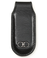 The modern magnetic closure of this money clip contrasts with the classic appeal of the leather for a refined, updated design. The modern magnetic closure of this money clip contrasts with the classic appeal of the leather for a refined, updated design.