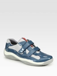 Sleek and modern rendition of leather and mesh, with Velcro® tab closures.Patent leather upperPadded insoleRubber soleImported Sleek and modern rendition of leather and mesh, with Velcro® tab closures.Patent leather upperPadded insoleRubber soleImported