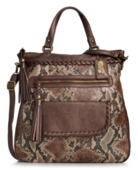 Embrace your exotic instincts with this posh, python print tote from Carlos by Carlos Santana. Exquisite detail stitching and flirty tassel accent adorn the outside, while the ultra-roomy interior transports all your essentials with ease. Embrace your exotic instincts with this posh, python print tote from Carlos by Carlos Santana. Exquisite detail stitching and flirty tassel accent adorn the outside, while the ultra-roomy interior transports all your essentials with ease.