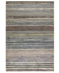 Variegated tones of bone, tan, silver, teal and sage are interwoven across this Taylor Vibrato area rug from Couristan, creating the ultimate floor accent for complementing industrial and mid-century decors. Wilton-woven for unparalleled depth, texture and quality. Variegated tones of bone, tan, silver, teal and sage are interwoven across this Taylor Vibrato area rug from Couristan, creating the ultimate floor accent for complementing industrial and mid-century decors. Wilton-woven for unparalleled depth, texture and quality.
