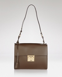 Precision crafted from smooth leather, this shoulder bag from Salvatore Ferragamo is an ever-chic investment with proportions that ease the transition from day to night. Precision crafted from smooth leather, this shoulder bag from Salvatore Ferragamo is an ever-chic investment with proportions that ease the transition from day to night.