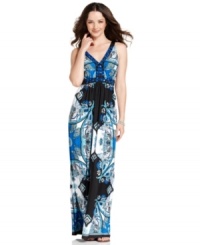 A slinky maxi dress from ECI gets a fresh update with a bold pattern and bright, colorful beading. Go barefoot on the beach by day then add chic sandals to dress it up for an evening out. A slinky maxi dress from ECI gets a fresh update with a bold pattern and bright, colorful beading. Go barefoot on the beach by day then add chic sandals to dress it up for an evening out.
