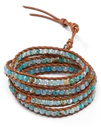 Chan Luu wraps up boho luxe style with this five-strand leather bracelet, accented by a free spirited mix of semi precious aqua-colored stones. Chan Luu wraps up boho luxe style with this five-strand leather bracelet, accented by a free spirited mix of semi precious aqua-colored stones.