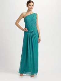 A vision is silk chiffon, with an accent of shimmering stones at the shoulder.Single gathered shoulder Asymmetric gathers at center front Hidden side zip closure Shirring at side About 43 from natural waist Silk; polyester lining Dry clean Imported A vision is silk chiffon, with an accent of shimmering stones at the shoulder.Single gathered shoulder Asymmetric gathers at center front Hidden side zip closure Shirring at side About 43 from natural waist Silk; polyester lining Dry clean Imported