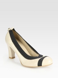 Timeless leather style with contrasting elastic trim for a tailored fit and suede lining. Self-covered heel, 3 (75mm)Nappa leather and elastic upperSuede liningLeather solePadded insoleImported Timeless leather style with contrasting elastic trim for a tailored fit and suede lining. Self-covered heel, 3 (75mm)Nappa leather and elastic upperSuede liningLeather solePadded insoleImported