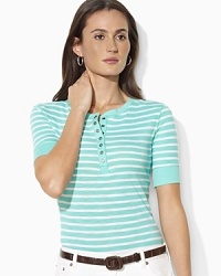 Lightweight slub cotton jersey lends a breezy quality and subtle texture to a striped short-sleeved Henley, finished with sleek metal snaps for a modern touch. Lightweight slub cotton jersey lends a breezy quality and subtle texture to a striped short-sleeved Henley, finished with sleek metal snaps for a modern touch.