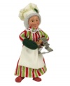 Mrs. Claus spreads cheer in the kitchen, baking alongside Santa in the Vanilla Icing Gingerbread House figurines collection, handcrafted by Byers' Choice. Festive for holiday kitchens!