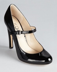 KORS Michael Kors gives a classic patent pump a timeless, ladylike touch with a delicate maryjane strap. KORS Michael Kors gives a classic patent pump a timeless, ladylike touch with a delicate maryjane strap.