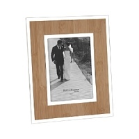 A faux bamboo insert provides the perfect backdrop, with silver accents for a natural yet eye-catching frame.