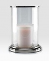 Gleaming glass and polished nickel is crafted to house a single pillar candle for a beautiful, ethereal effect.5¾ L x 8 HGlass and nickelImported