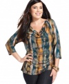 Style&co.'s three-quarter-sleeve plus size top is a perfect addition for your day-to-play wardrobe-- dress it up with trousers or down with denim!