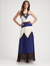 Sheer beauty in bands and blocks of color, with a camisole style top and a long, flowing, crystal-pleated skirt.Wide strapsSquare necklineSoft gathers at waistContrast beltSide zipperCrystal pleated skirtFully linedAbout 43 from natural waistPolyesterDry cleanImportedModel shown is 5'9½ (176cm) wearing US size 4. Sheer beauty in bands and blocks of color, with a camisole style top and a long, flowing, crystal-pleated skirt.Wide strapsSquare necklineSoft gathers at waistContrast beltSide zipperCrystal pleated skirtFully linedAbout 43 from natural waistPolyesterDry cleanImportedModel shown is 5'9½ (176cm) wearing US size 4.