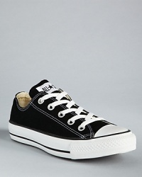 Converse low-top canvas sneakers have old-school charm. Comfortable classic lace-up style and rubber-covered toe. Converse low-top canvas sneakers have old-school charm. Comfortable classic lace-up style and rubber-covered toe.