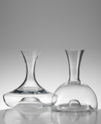 Marrying the finest modern innovations with graceful contemporary style, this dramatic decanter (shown left) is a lavish treat for any wine. An inward curved base allows carafe to be gripped from the body for ease of pouring, while Eisch's trademarked No Drop Effect© keeps wine from dripping outside the decanter. Holds 50 oz. (Clearance) Marrying the finest modern innovations with graceful contemporary style, this dramatic decanter (shown left) is a lavish treat for any wine. An inward curved base allows carafe to be gripped from the body for ease of pouring, while Eisch's trademarked No Drop Effect© keeps wine from dripping outside the decanter. Holds 50 oz. (Clearance)