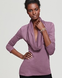 A solid essential for wearing now and layering later with a drapey cowl neck for a decidely feminine touch. A solid essential for wearing now and layering later with a drapey cowl neck for a decidely feminine touch.